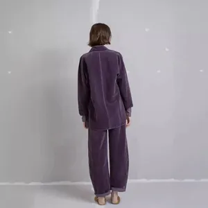 Elegant purple velvet two-piece set featuring stand collar top and wide-leg casual pants