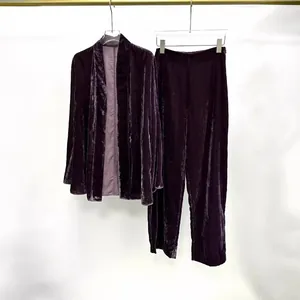 Elegant purple velvet two-piece set including open-front jacket and leisure trousers