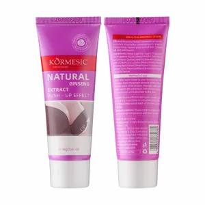 Detail view of KORMESIC natural breast enlargement cream packaging and ingredients