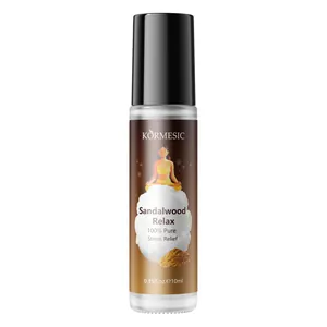 Natural sandalwood essential oil rollerball bottle for stress relief and relaxation