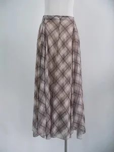 French style brown plaid midi skirt with irregular hem and elegant drape for women.