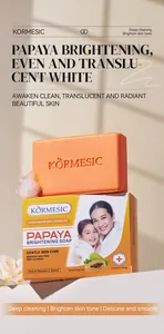 Detail view of KORMESIC papaya brightening soap bar with moisturizing packaging