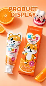 Pasta de dientes infantil con flúor KORMESIC sabor naranja y envase de perro Shiba Inu