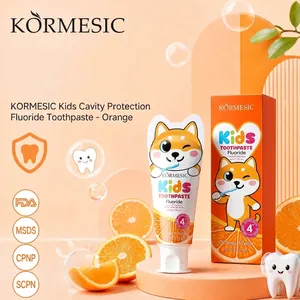 Pasta de dientes KORMESIC para niños sabor naranja con una linda mascota Shiba Inu