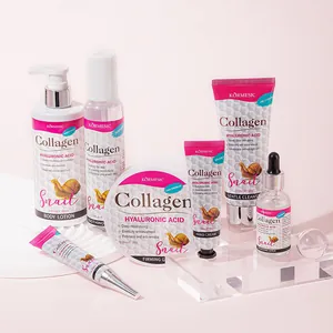 Set completo KORMESIC per la cura della pelle al collagene di lumaca su sfondo rosa