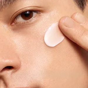 Lightweight men's tone-up cream application on skin for natural and easy grooming