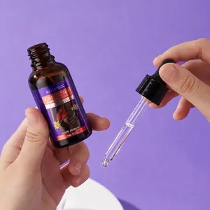 KORMESIC garlic hip enlargement essential oil with a dropper on purple background