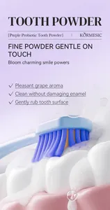 Detalle del polvo dental probiótico púrpura con un cepillo de dientes suave.