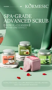 Variety of KORMESIC exfoliating body and face scrubs in a luxury spa-themed setting