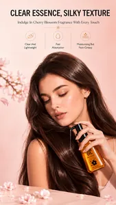 Modèle appliquant l'huile capillaire KORMESIC aux fleurs de cerisier pour des cheveux soyeux.