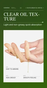 Macro view of the clear, light and non-greasy olive and argan hair oil texture on hand