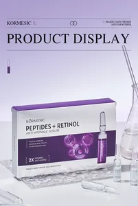 Close-up of KORMESIC Peptides and Retinol anti-wrinkle serum box and glass ampoules.