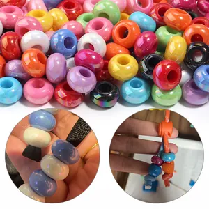 Macro view of colorful UV-plated acrylic beads with iridescent finish for DIY
