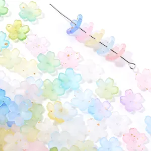 Detailed view of pastel frosted flower beads with gold flecks for DIY jewelry making