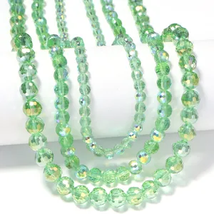 Cuentas de cristal facetado verde claro con brillo AB para manualidades de joyería