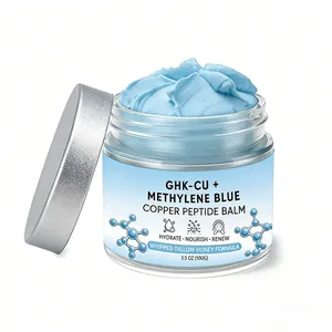 Detailed macro view of light blue GHK-CU Copper Peptide Balm in a premium glass jar