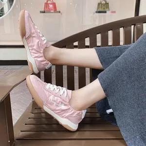 Stylish breathable pink ballet-style training sneakers for women featuring Angel embroidery