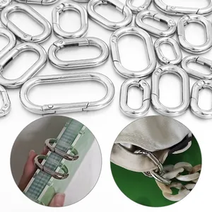 Close-up of silver oval spring snap hooks used for binders and bag chain straps.