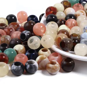 Close-up of colorful vintage resin beads with marble texture for DIY jewelry making