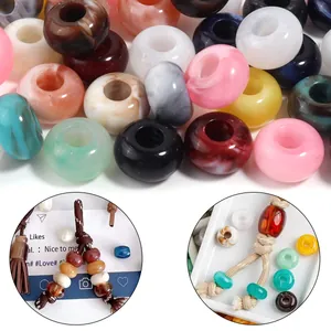 Close-up of marbled acrylic beads in various colors for DIY jewelry crafts