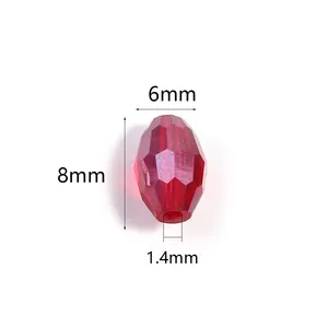 Vista dettagliata della perla di cristallo sfaccettato rosso 6x8mm con foro da 1,4mm
