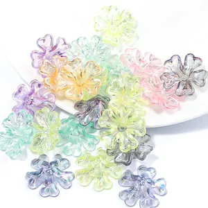 Close-up of colorful iridescent five-petal flower beads for DIY jewelry making