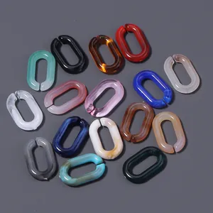 Diverse kleurrijke acryl U-vormige schakels met marmertextuur voor doe-het-zelf sieraden