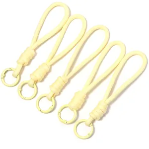 Set of five light yellow braided loop lanyards with circular carabiner clips for accessories