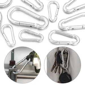 Detailed view of silver zinc alloy carabiners used for keychains and outdoor ropes