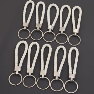 Set di 10 laccetti in pelle PU intrecciata bianca con portachiavi in metallo argento