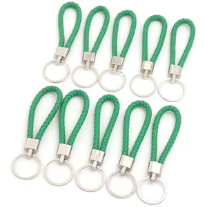 Set di portachiavi in pelle intrecciata verde con anelli in metallo per borse