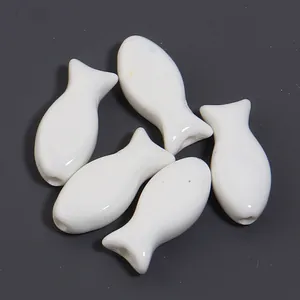 White glossy fish-shaped ceramic loose beads for DIY jewelry making