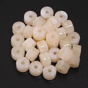 Cuentas de barril de acrílico crema con textura jaspeada para bisutería DIY y artesanía.