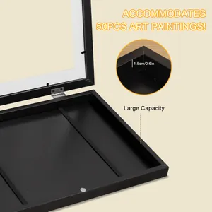 Deep black wooden A4 frame detail showing 1.5cm depth for 50 pieces of art.
