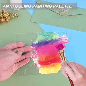 Tavolozza per pittura in acrilico trasparente con colori vivaci e pennello artistico