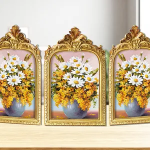 Set aus drei goldenen Barock-Resin-Rahmen mit Gänseblümchen-Ölgemälden für Schmuck