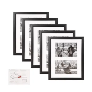 Set aus 5 minimalistischen schwarzen Bilderrahmen mit Passepartouts und Zubehör.