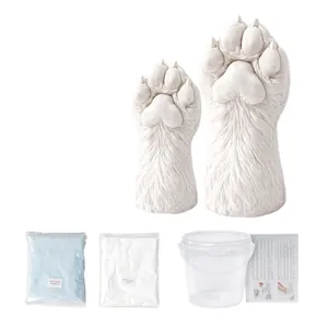 DIY pet paw print kit with plaster clone powder and molding bucket
