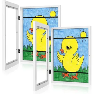 White magnetic kids art frame featuring flip-top storage for children's drawings and artwork