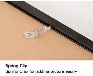 Détail macro du mécanisme à clip à ressort sur un cadre de diplôme A4 de 8,5x11 po.