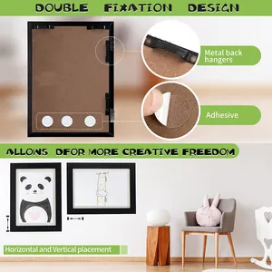 Detailed view of kids art frame back hangers and adhesive dots for wall mounting options