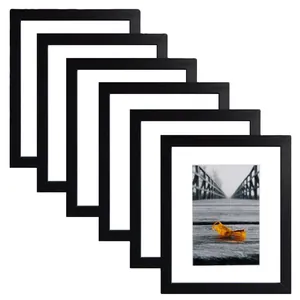 Juego de 6 marcos de fotos minimalistas de madera negra con paspartú blanco para pared