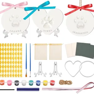 Complete pet paw print clay kit with heart molds, colorful paints, ribbons and display stands