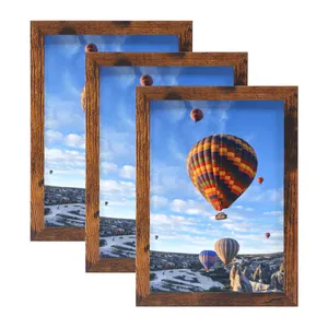 Lot de trois cadres photo en bois rustique avec inserts d'art de paysage de montgolfière