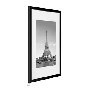 Side view of a 0.59-inch thin black PVC picture frame with an Eiffel Tower print.