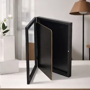 Detailed view of the open black jersey display frame with deep shadow box structure