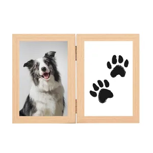 Double-hinged wooden pet memorial photo frame with paw print and dog photo display