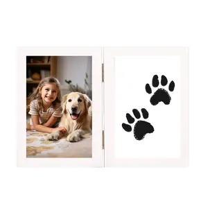 Double hinged white wooden photo frame with pet paw prints and child-dog photo detail