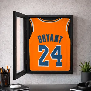 Professional wall-mounted black jersey display frame showcasing a Kobe Bryant jersey