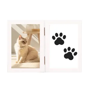 White wooden hinged double photo frame stand for pet memorial with black paw print design